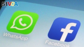Many refugees and migrants use WhatsApp and Facebook to get and send important information. (AP Photo/Patrick Sison)