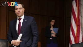 Sen. Marco Rubio, R-Fla., arrives to testify at a Senate Judiciary Committee hearing on Wednesday, March 14, 2018, on Capitol Hill in Washington. (AP Photo/Jacquelyn Martin)