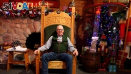 Thomas Valent, dean of the Charles W. Howard Santa Claus School, sits in the Santa House in Midland, Michigan, Oct. 29, 2016.