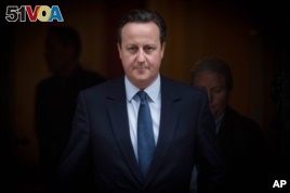 Prime Minister David Cameron leaves 10 Downing Street in London 