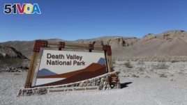 FILE - A view of the Death Valley National Park sign is seen in Death Valley, Calif., Feb. 14, 2017.
