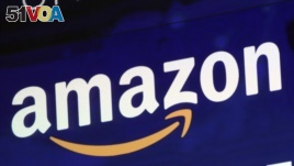 FILE - In this July 27, 2018 file photo, the logo for Amazon is displayed on a screen at the Nasdaq MarketSite. 