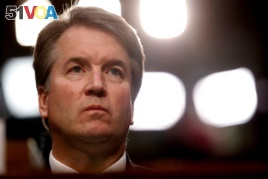 FILE - U.S. Supreme Court nominee Brett Kavanaugh listens during his Senate Judiciary Committee confirmation hearing on Capitol Hill in Washington, September 4, 2018.