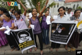 FILE - Sri Lankan women shout slogans during a protest in Colombo, Sri Lanka, Jan. 11, 2013, condemning the execution of Sri Lankan domestic worker Rizana Nafeek in Saudi Arabia. (AP Photo/Eranga Jayawardena)