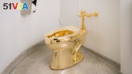 The Guggenheim Museum in New York has installed an 18-carat, solid gold toilet that patrons can use. (Guggenheim)