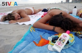 FILE - There are several sunscreen applications to choose from, sprays, dry oils, powders and even wipes. (AP File Photo/Mary Godleski)