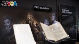 An exhibit discussing slavery in the United States is displayed inside the Museum of the Bible, Monday, Oct. 30, 2017, in Washington. (AP Photo/Jacquelyn Martin)