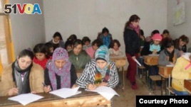 Students learn the Kurdish language at a local school in Amude, Syria, in August 2015. (Photo courtesy of Bedirxan Committee for Teaching Kurdish)