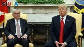 FILE - President Donald Trump and European Commission president Jean-Claude Juncker discussed working together on trade in the Oval Office of the White House, Wednesday, July 25, 2018, in Washington. (AP Photo/Evan Vucci)