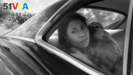In this image released by Netflix, Yalitza Aparicio in a scene from 