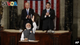 Indian Prime Minister Narendra Modi gestures before addressing a joint meeting of Congress on Capitol Hill in Washington, June 8, 2016. 