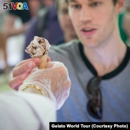 A festival-goer tastes gelato at the Gelato World Tour event in Chicago.