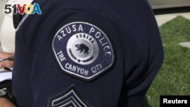 FILE - The insignia on an Azusa police officer's uniform.