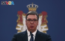 In this March 15, 2020, photo, Serbian President Aleksandar Vucic speaks during a news conference in Belgrade, Serbia. Since declaring nationwide state of emergency Vucic has suspended parliament, giving him widespread powers.