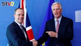 Britain's Secretary of State for Exiting the European Union, Dominic Raab and the European Union's chief Brexit negotiator, Michel Barnier, at a meeting in Brussels, Belgium, July 19, 2018.