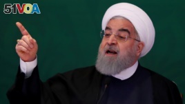 Iranian President Hassan Rouhani spoke on state television to say Iran might seek to stay in the nuclear deal that has reduced sanctions on his country even if the U.S. withdraws from it. In this picture, he is speaking earlier this year. 