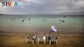 Scientists say the surface of the Dead Sea is dropping by about one meter a year. Below average rainfall is causing the sea to lose more water.