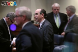 Senator Clyde Chambliss (R), center, is seen with other senators during a state Senate vote on the strictest anti-abortion bill in the United States at the Alabama Legislature in Montgomery, Alabama, May 14, 2019.