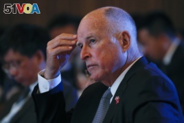 California Gov. Jerry Brown attends the Clean Energy Ministerial International Forum on Electric Vehicle Pilot Cities and Industrial Development, at a hotel in Beijing, June 6, 2017.