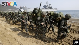 South Korean Marines take part in a landing exercise during joint US-South Korean military training last year. This year's exercises known as Key Resolve and Foal Eagle are expected to be the largest ever.