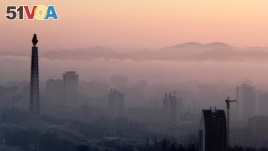 FILE - The 170-meter tall Juche Tower and other buildings are seen as morning fog blankets Pyongyang, North Korea, September 8, 2018. (REUTERS/Danish Siddiqui/File Photo)