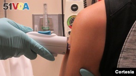 A healthy volunteer receives the NIAID Zika virus investigational DNA vaccine as part of an early-stage trial to test the vaccine's safety and immunogenicity. This is the first administration of this vaccine in a human. 