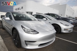 Tesla Model 3 is one of many electric vehicles powered by lithium-ion batteries. (AP Photo/David Zalubowski, File)
