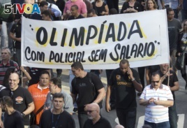 Police protest their pay in late June, just weeks before the opening of the Rio Olympics.