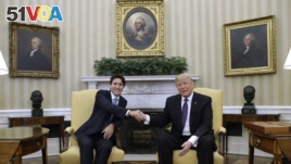 After winning his election, President Donald Trump meets other world leaders. Here, he is pictured with Canadian Prime Minister Justin Trudeau in the Oval Office of the White House in Washington, Feb. 13, 2017. (AP Photo/Evan Vucci)