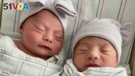 Twins Aylin Trujillo, born at 00:00 on January 1, 2022, and Alfredo Trujillo, born at 23:45 on December 31, 2021, are pictured in Salinas, California, U.S., January 1, 2022 in this image from social media. (Natividad Medical Center/via REUTERS)