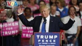 Republican presidential candidate, Donald Trump, speaks during a campaign rally late Saturday, Nov. 5, 2016, in Denver. (AP Photo/David Zalubowski)