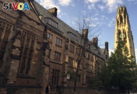 FILE - Harkness Tower on the campus of Yale University in New Haven, Conn., Sept. 9, 2016 photo. The Biden Justice Department says it is dismissing its discrimination lawsuit against Yale University.