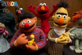 Bert and Ernie, as well as Elmo, center, are among a donation of additional Jim Henson objects to the Smithsonian's National Museum of American History in Washington, Sept. 24, 2013.