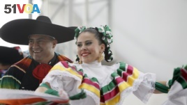 Members of a ballet folklorico perform outside AT&T stadium as part of the Hispanic Heritage Month celebration before an NFL football game. (File)