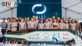 The Delft University of Technology team poses with its winning vehicle that took part in the Hyperloop competition held by SpaceX found Elon Must in Los Angeles. (Courtesy: Delft Hyperloop)