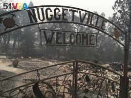 FILE - This Wednesday, Nov. 14, 2018 shows the remains of the Gold Nugget Museum, which was totally demolished by the Camp Fire, in Paradise, Calif. Paradise, Cali., literally went up in smoke in the deadliest, most destructive wildfire in California hist