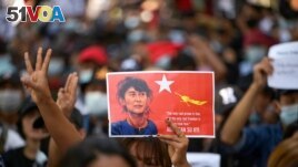People rally in a protest against the military coup and to demand the release of elected leader Aung San Suu Kyi, in Yangon, Myanmar, February 8, 2021. (REUTERS/Stringer)