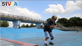 Yoshio Kinoshita practices skateboarding at a park in Daito, Osaka Prefecture, October 6, 2021. REUTERS/Akira Tomoshige