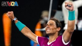 Rafael Nadal of Spain celebrates after defeating Matteo Berrettini of Italy in their semifinal match at the Australian Open tennis championships in Melbourne, Australia, Jan. 28, 2022. (AP Photo/Hamish Blair)
