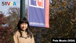 International student Marine Hayashi, from Japan, stands on the campus of American University