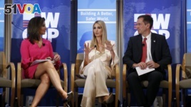 Ivanka Trump, center, daughter of President Donald Trump, announces the first grants that are part of a White House program to help women in developing countries, Wednesday, July 10, 2019, in Washington. (AP Photo/Patrick Semansky)