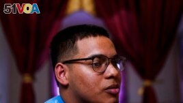 Mino Zuniga Gonzales, 19, speaks during an interview with The Associated Press in the Kensington section of Philadelphia, Sunday, May 16, 2021.