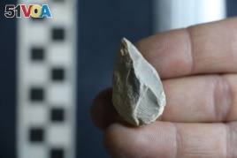 A prehistoric stone tool found at a cave in Zacatecas in central Mexico is seen in this image released on July 22, 2020.