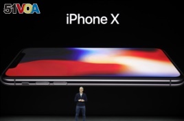 Apple CEO Tim Cook announces the new iPhone X.