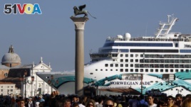 FILE - The Norwegian Jade cruise ship is seen from St. Mark square in Venice lagoon, June 16, 2012.