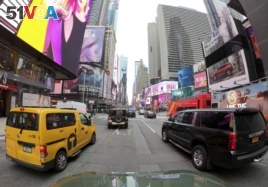 Motorists roll south on 7th Avenue in Times Square, Friday, March 29, 2019, in New York. A congestion toll that would charge drivers to enter New York City's central business district is a first for an American city. (AP photo)
