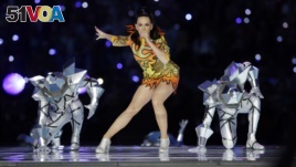 FILE - Singer Katy Perry performs during halftime of NFL Super Bowl XLIX football game between the Seattle Seahawks and the New England Patriots Sunday, Feb. 1, 2015, in Glendale, Ariz. (AP Photo/Michael Conroy)