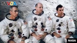 Apollo 10 astronauts Eugene Cernan, Lunar Module Pilot, Thomas Stafford, Commander and John Young, Command Module Pilot are seen in this NASA photograph.