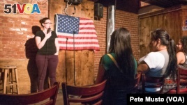 Comedian Katherine Jessup tells jokes at the Town Tavern open mike in Washinston, DC. (Peter Musto/VOA)