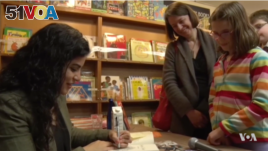 Hena Khan signing books in Washington, D.C.